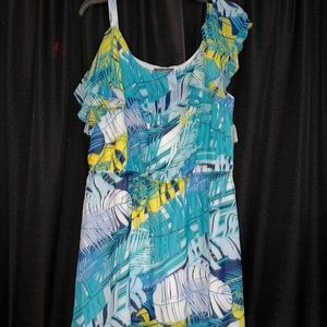 Beautiful new dress has a shorter front and slightly longer back